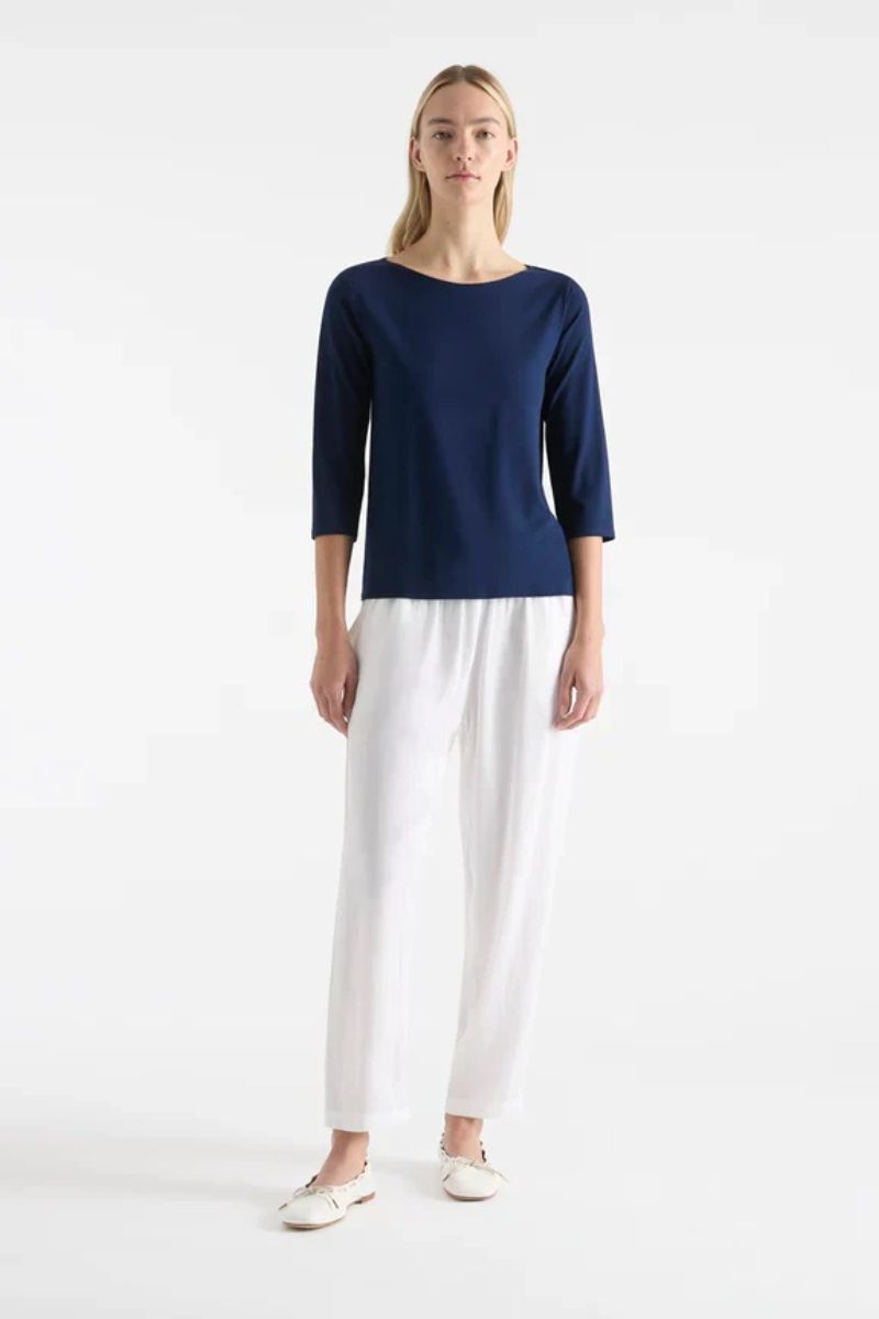 Woman wearing Relaxed Boat Neck in Denim by Mela Purdie style F01 2630 styled