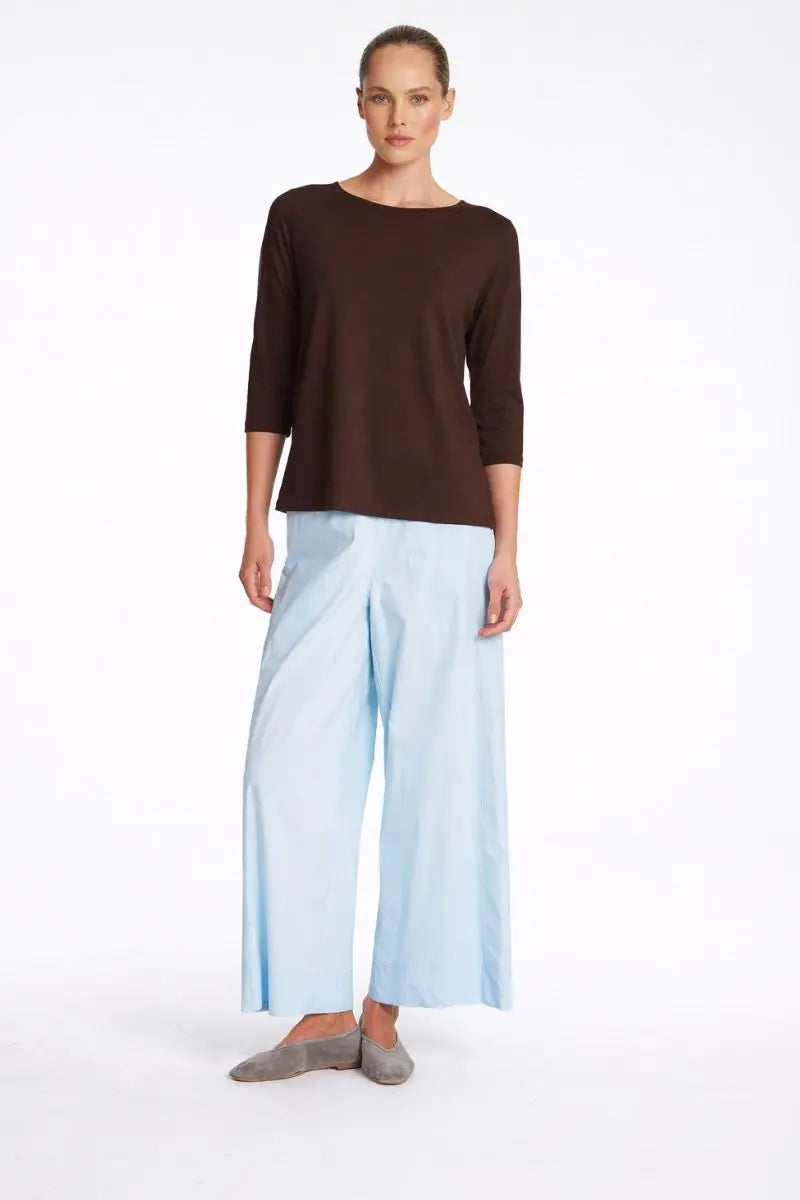 Woman wearing Relaxed Boat Neck Top in Fudge by Mela Purdie styled