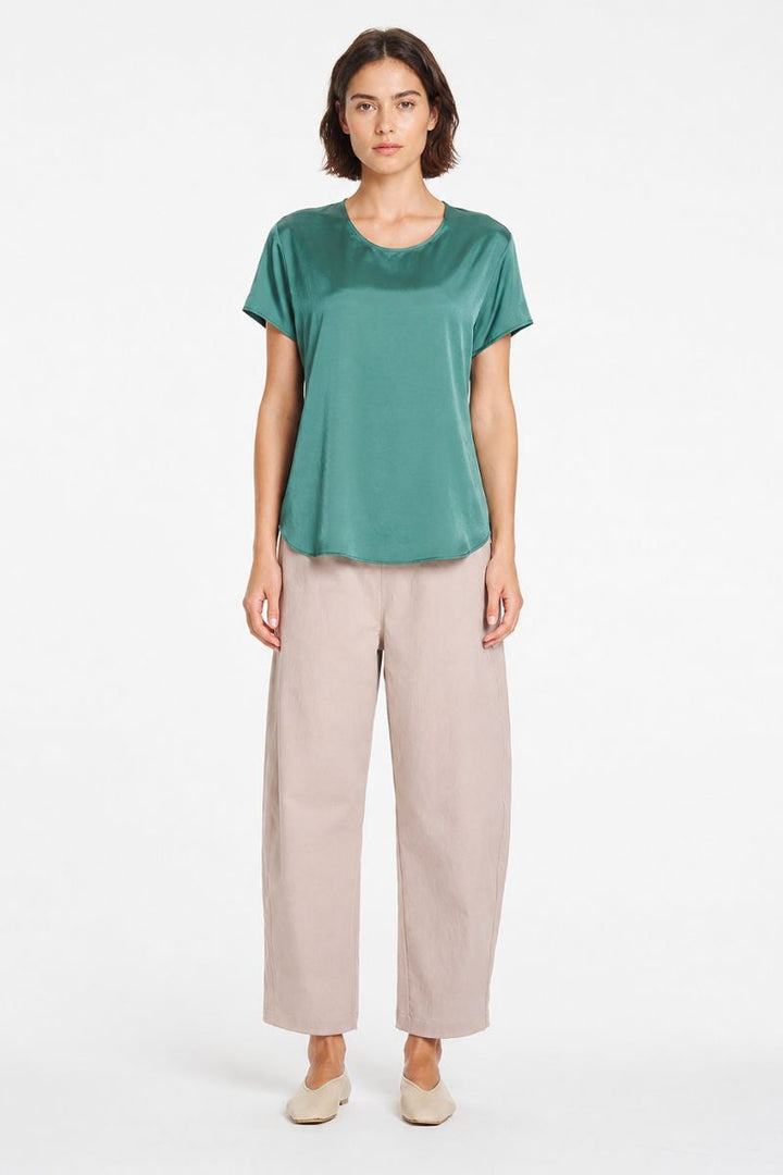 Mela Purdie Neo Shell in Verdant styled with tailored pants