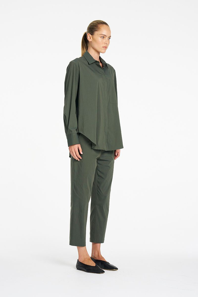 Mela Purdie Nomad Pant in Bayleaf side view showing tapered leg