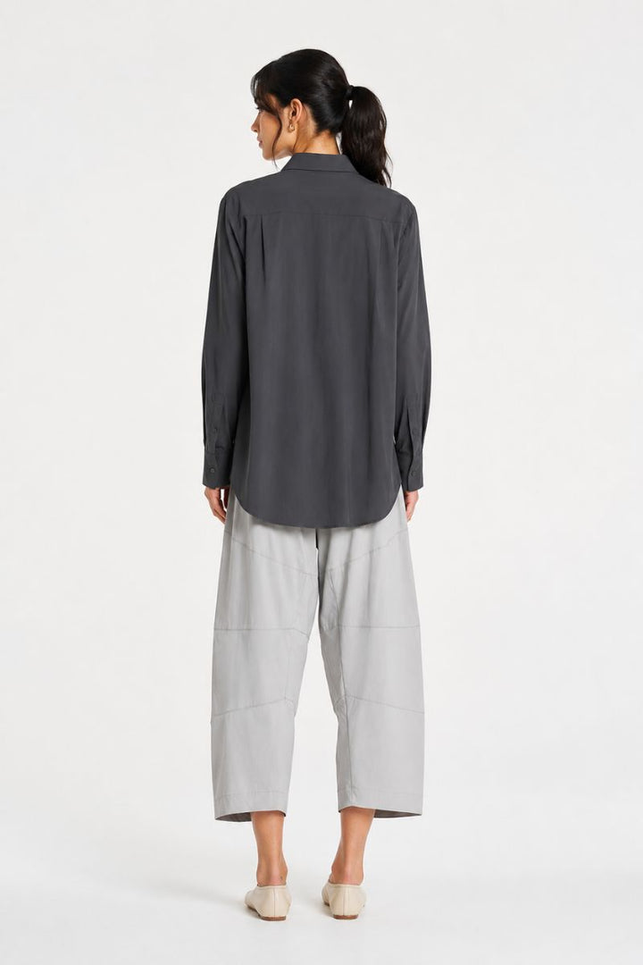 Woman wearing Saville Shirt in Canyon by Mela Purdie back