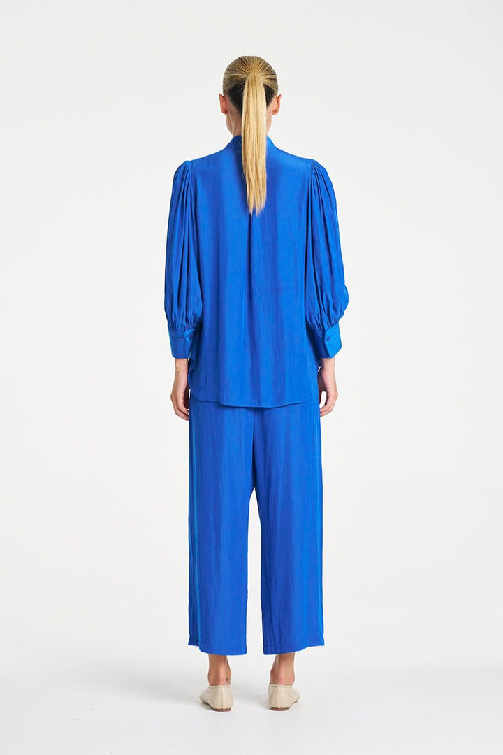 Mela Purdie Pace Pant Lagoon back view elastic waist F67 1740