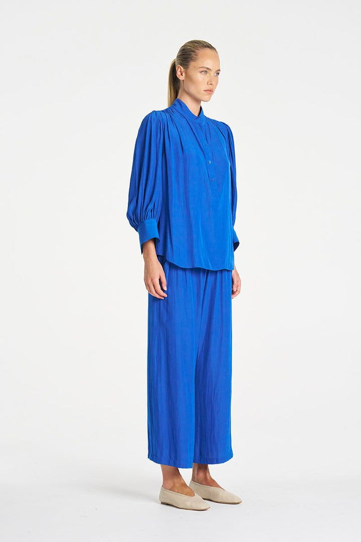 Mela Purdie Pace Pant side view showing drape and length F67 1740