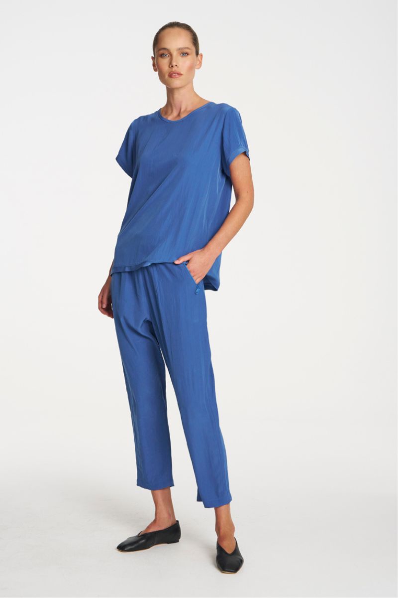 Woman wearing Travel T in Parisian by Mela Purdie detail