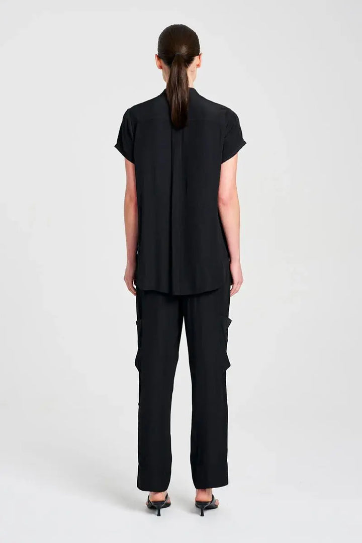 Woman wearing Soft Stand Shirt in Black by Mela Purdie back