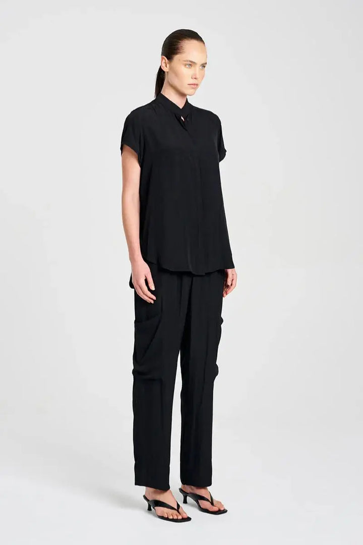 Woman wearing Soft Stand Shirt in Black by Mela Purdie side