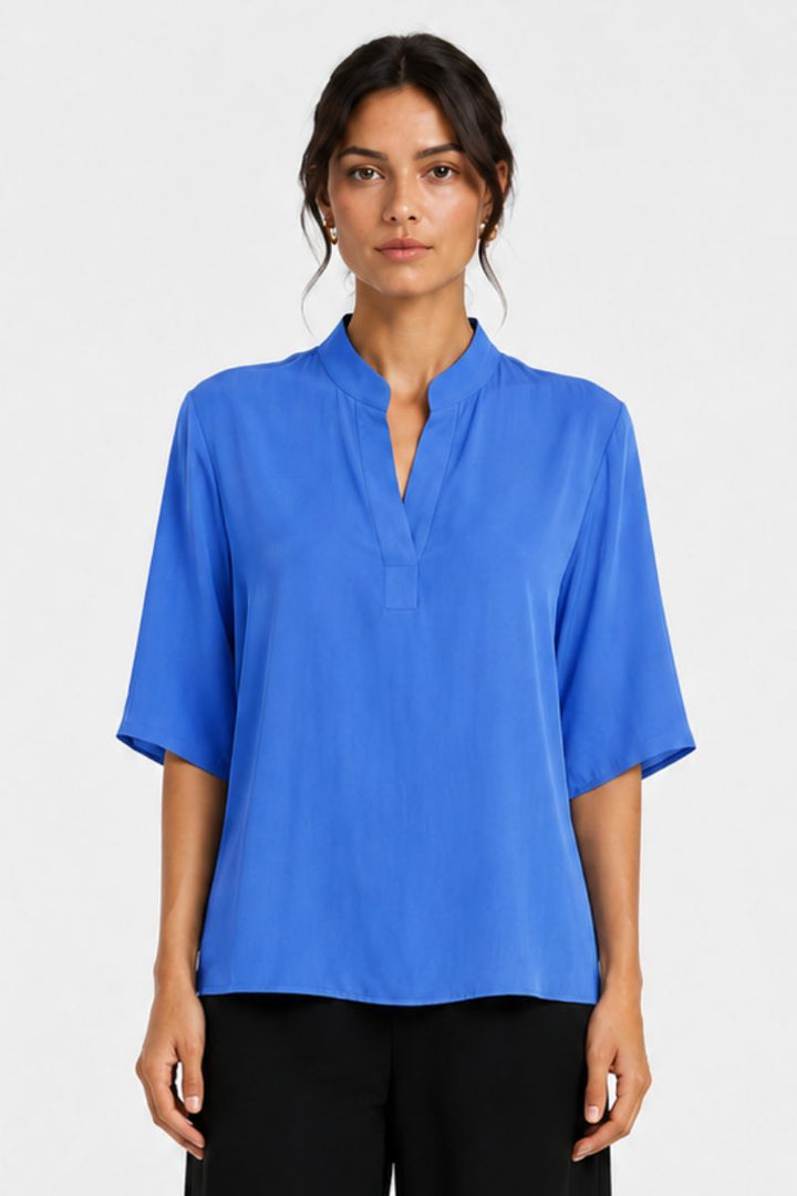 Woman wearing Placket Plaza in Lagoon Mache by Mela Purdie front