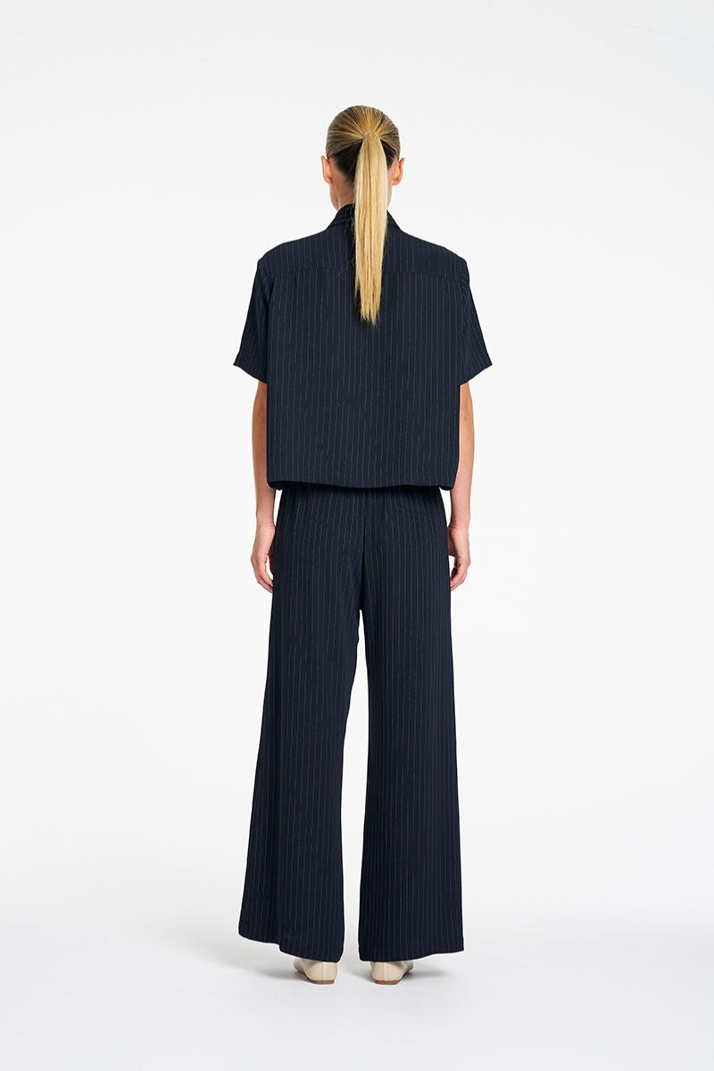 Mela Purdie Cropped Shirt in Navy Chalk back view showing relaxed fit