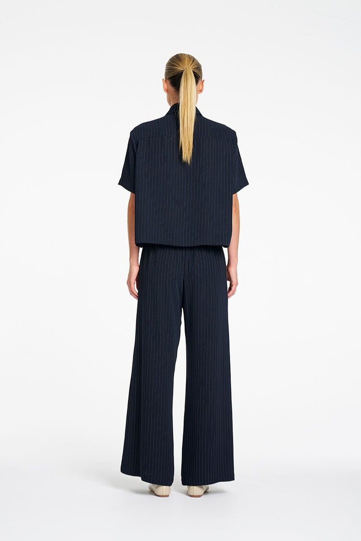 Mela Purdie Cropped Shirt in Navy Chalk back view showing relaxed fit