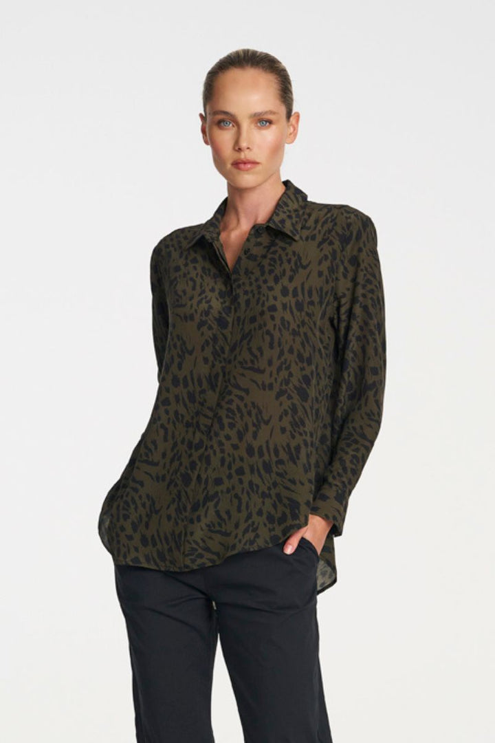 Woman wearing Soft Shirt in Amazon Print by Mela Purdie front