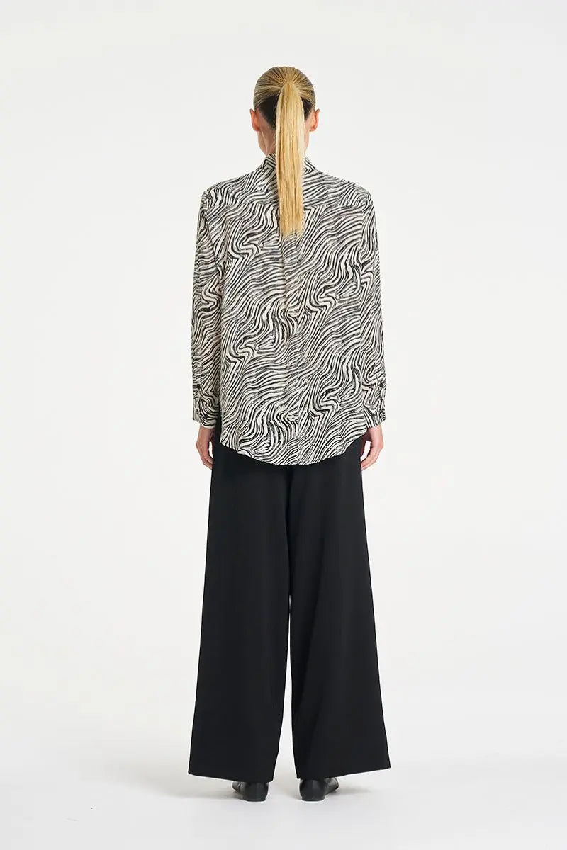 Woman wearing Soft Shirt in Fossil Silk Print by Mela Purdie back