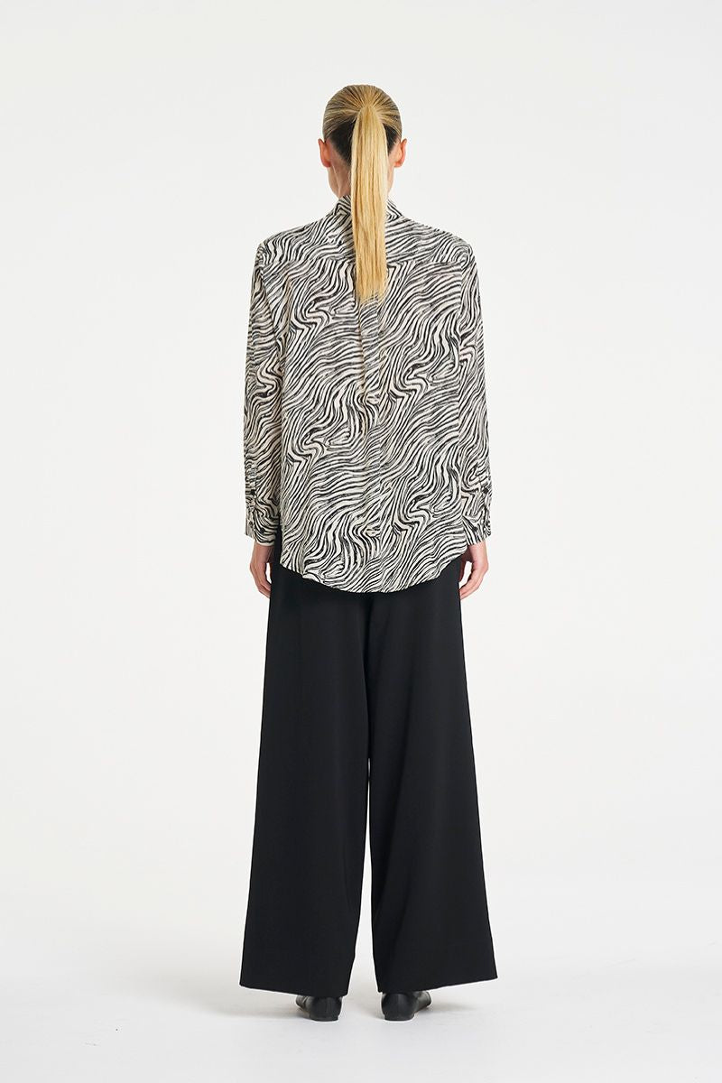 Woman wearing Soft Shirt in Fossil Silk Print by Mela Purdie back