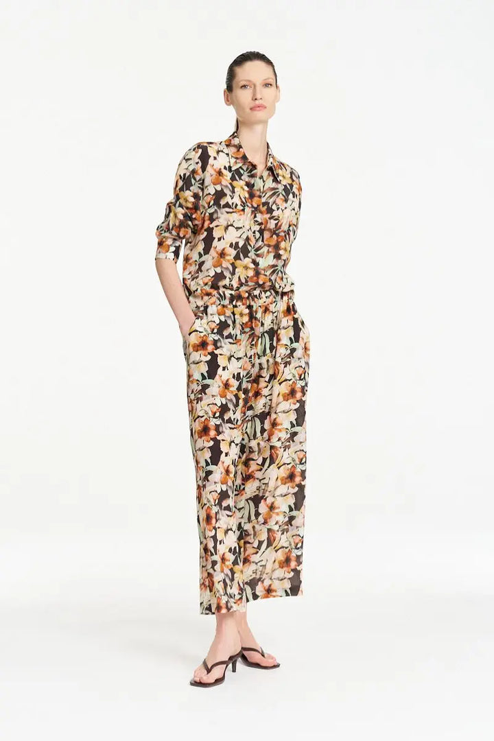 Woman wearing Soft Shirt in Mint Floral by Mela Purdie styled