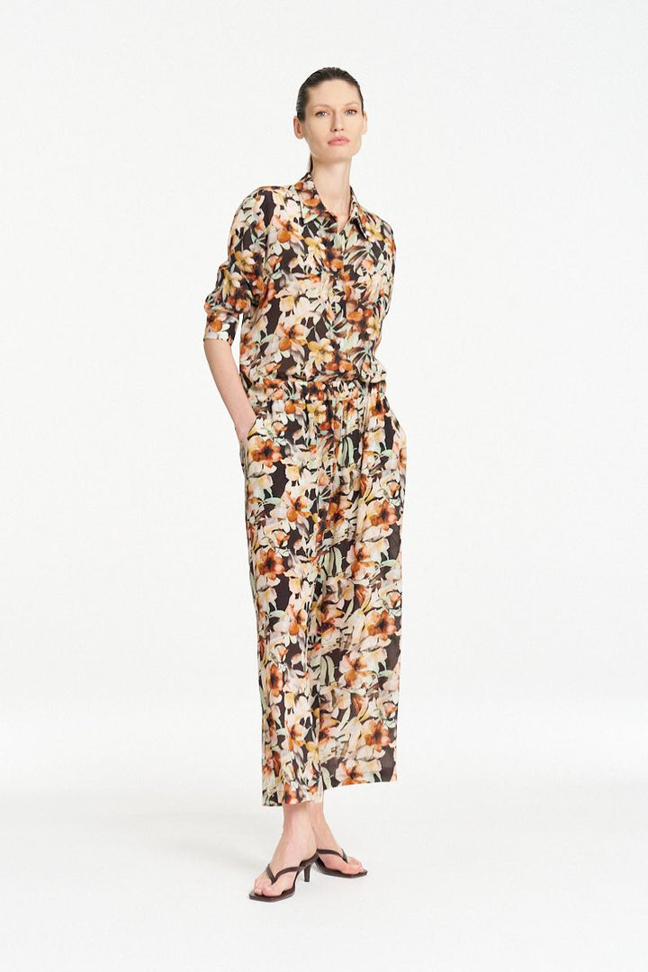 Woman wearing Soft Shirt in Mint Floral by Mela Purdie styled