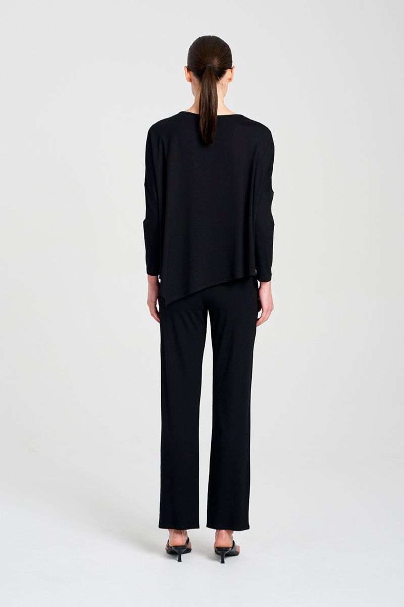 Woman wearing Long Pant in Black by Mela Purdie F01 100, back view styled with a black top.