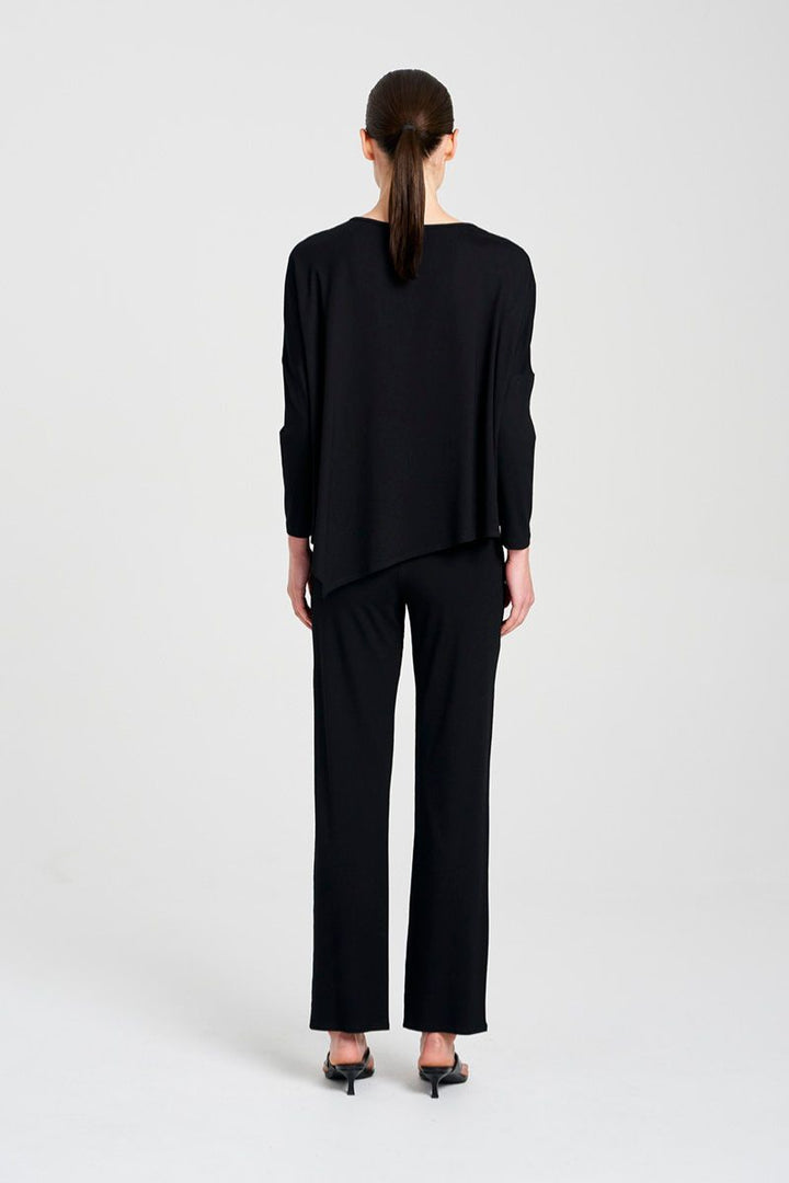 Woman wearing Long Pant in Black by Mela Purdie F01 100, back view styled with a black top.