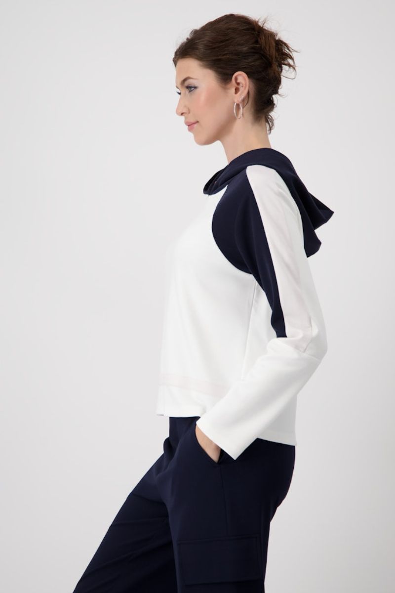 Woman wearing Monari hooded sweatshirt in navy and white style 409090 side