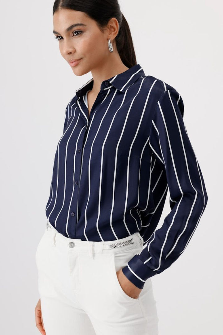 Woman wearing Monari striped satin blouse in ocean style 409358MNR side