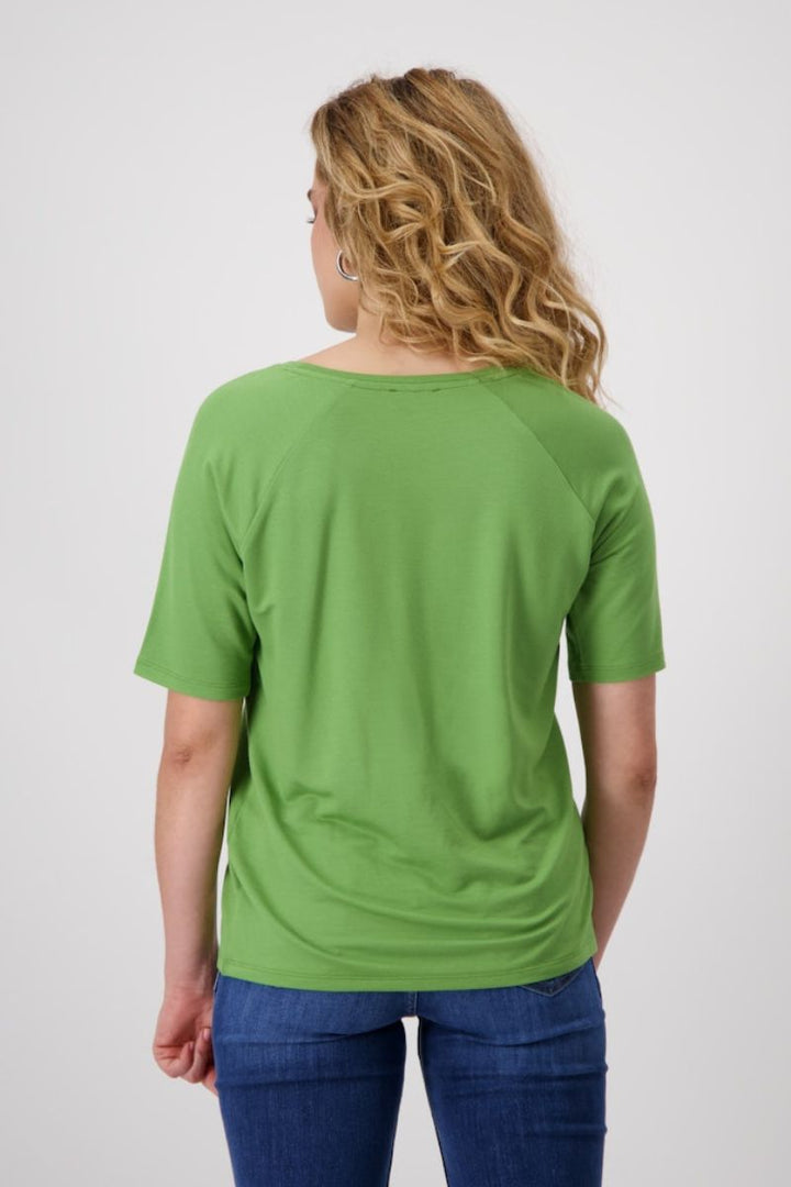 Woman wearing Monari T-shirt in avocado style 409372MNR back