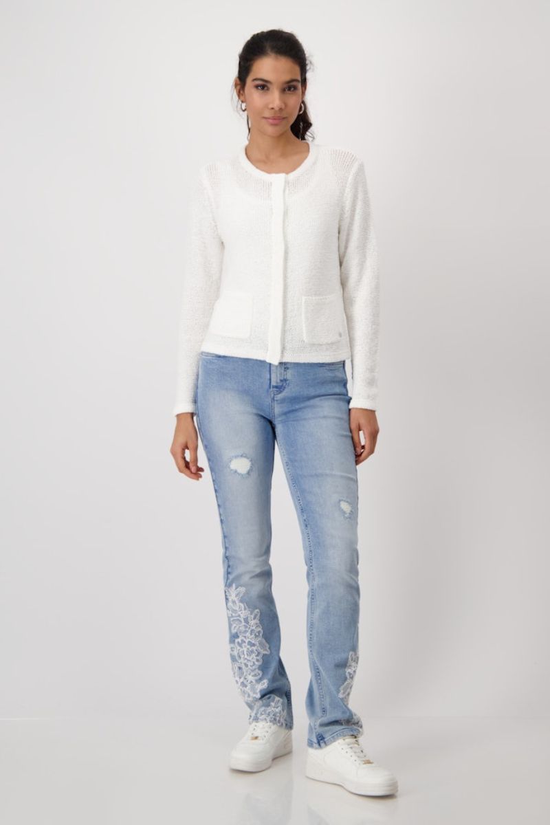 Woman wearing Monari ribbon detail knit jacket in off white style 409396MNR styled