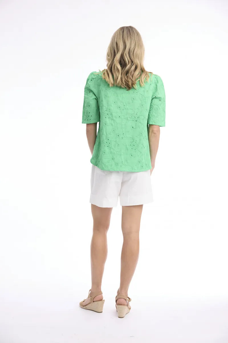 Woman wearing Orientique 1362 Broderie Top in Green, back view