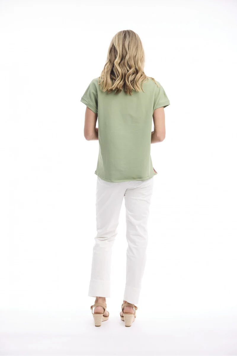 Woman wearing Orientique Digital Printed T-Shirt in Indian Vibes 82006 back view showing sage cotton Lycra jersey
