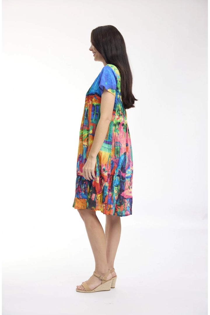 Woman wearing Orientique Easy Fit Dress French Restaurant 21883F side view showing relaxed fit and knee-length hem