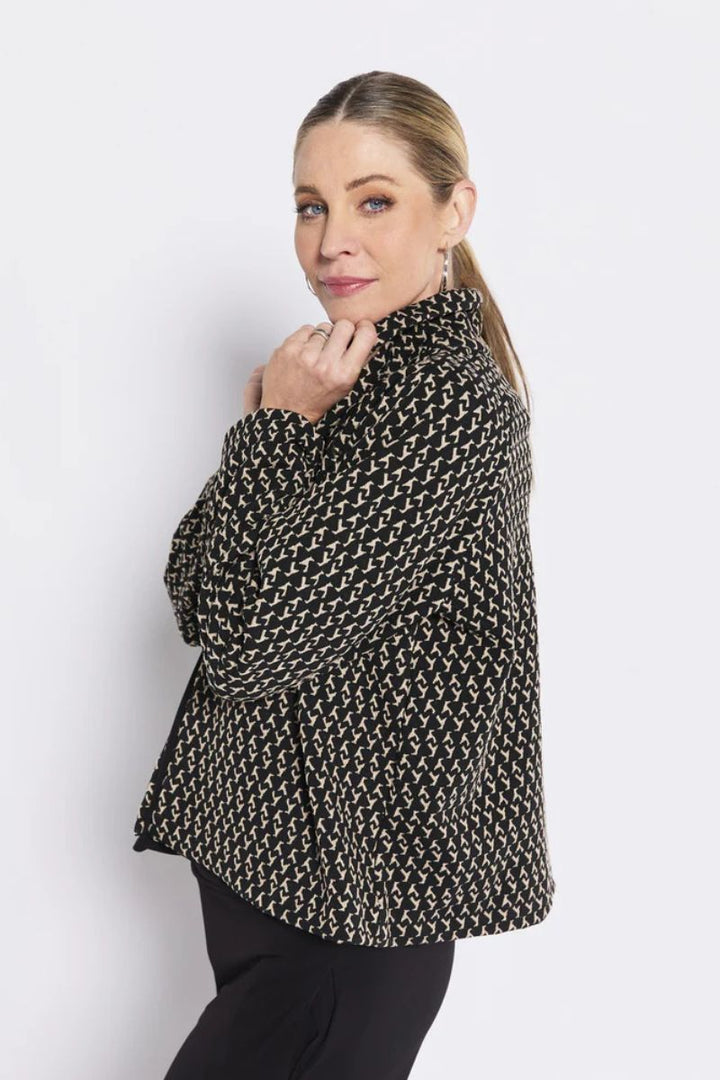 Woman wearing Buckingham Cropped Jacket in Black and Beige by Philosophy Australia side