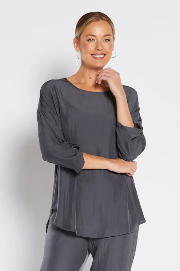 Woman wearing philosophy sinitta w26 sinitta lustre technical tunic squid grey detail
