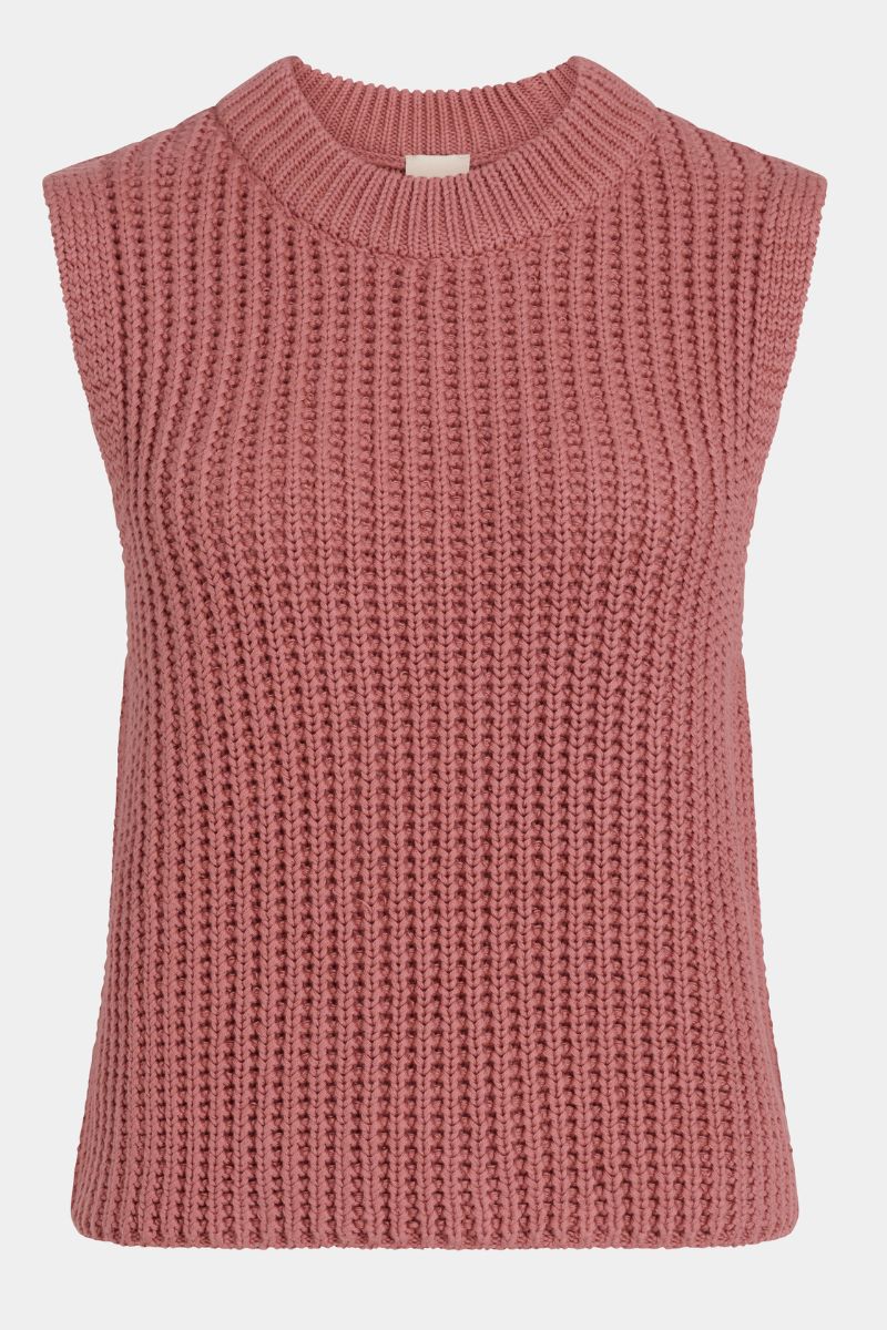 Pink knitted sleeveless sweater on a white background