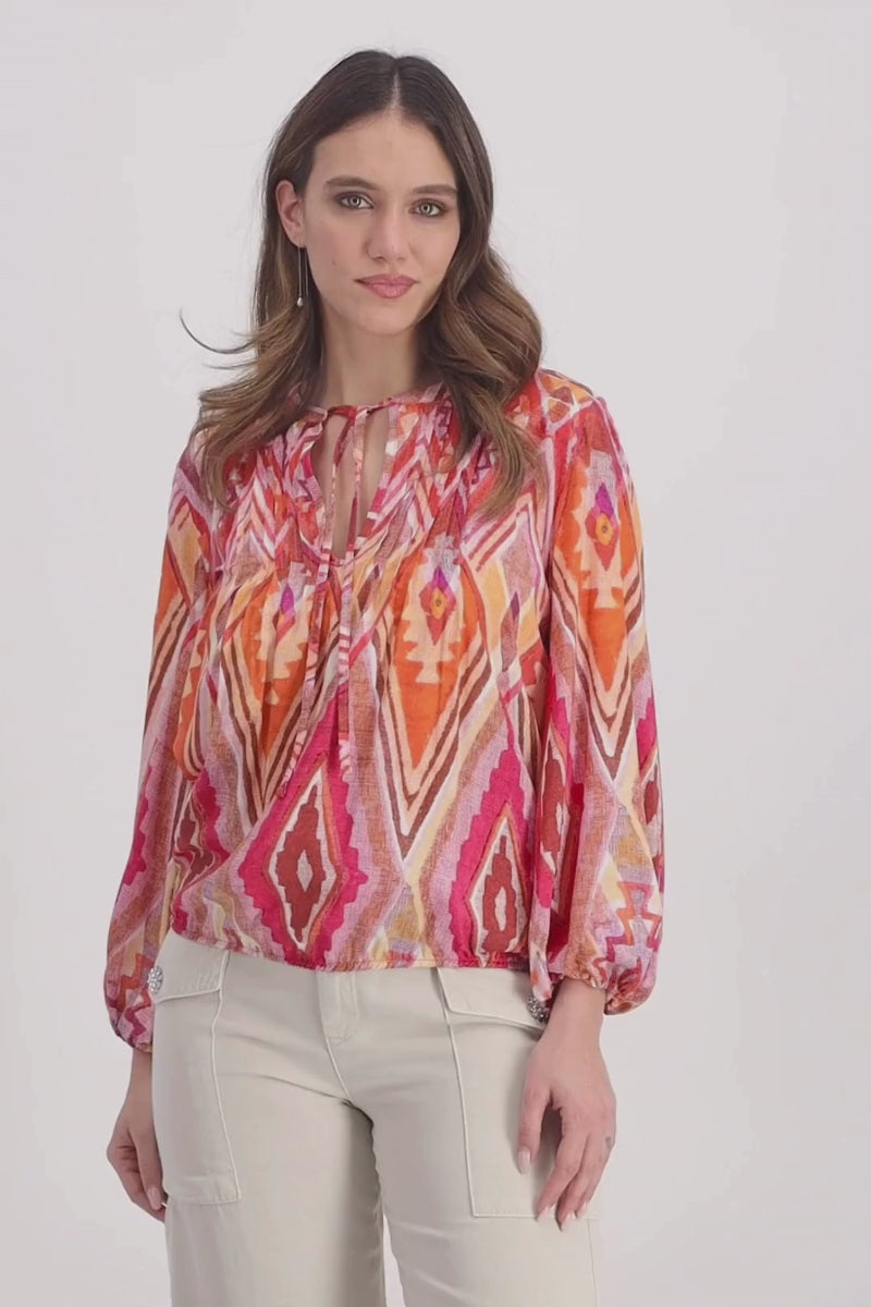 Video of a Woman wearing Monari 408788MNR Berry Ikat Blouse front view