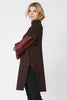 rina-poncho-knit-in-blue-nu-denmark-side-view_1200x