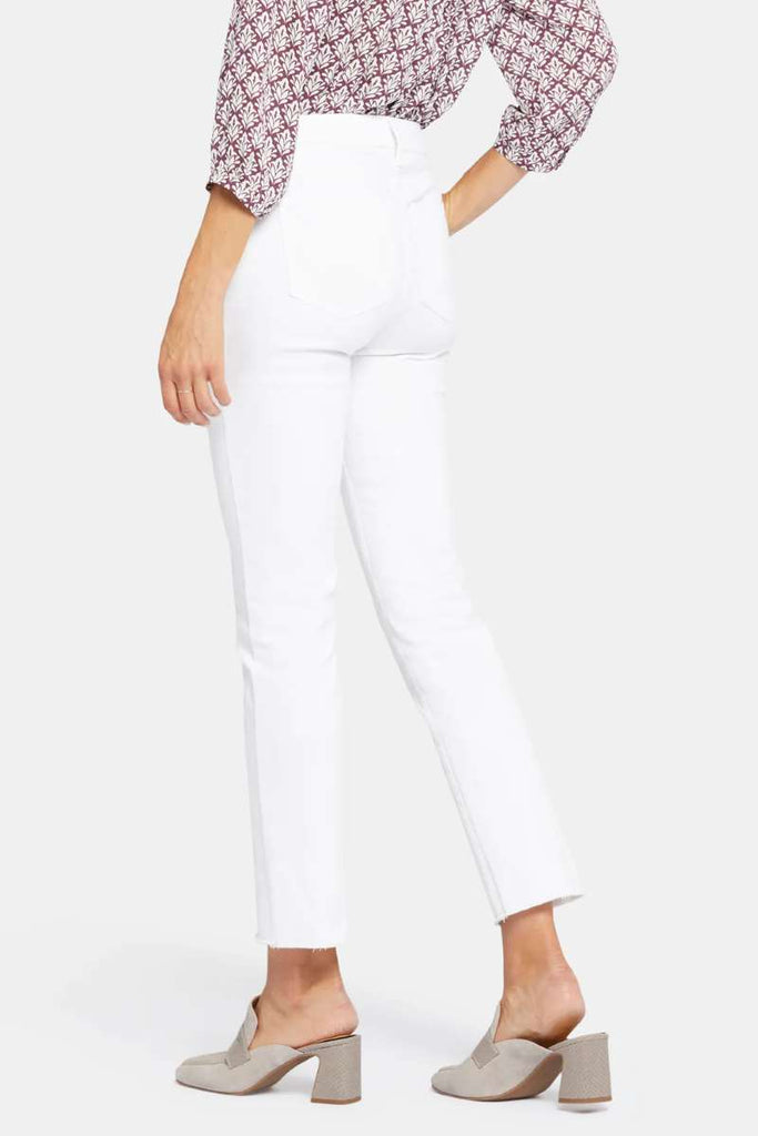 sheri-slim-ankle-jeans-with-frayed-hems-in-optic-white-nydj-back-view_1200x