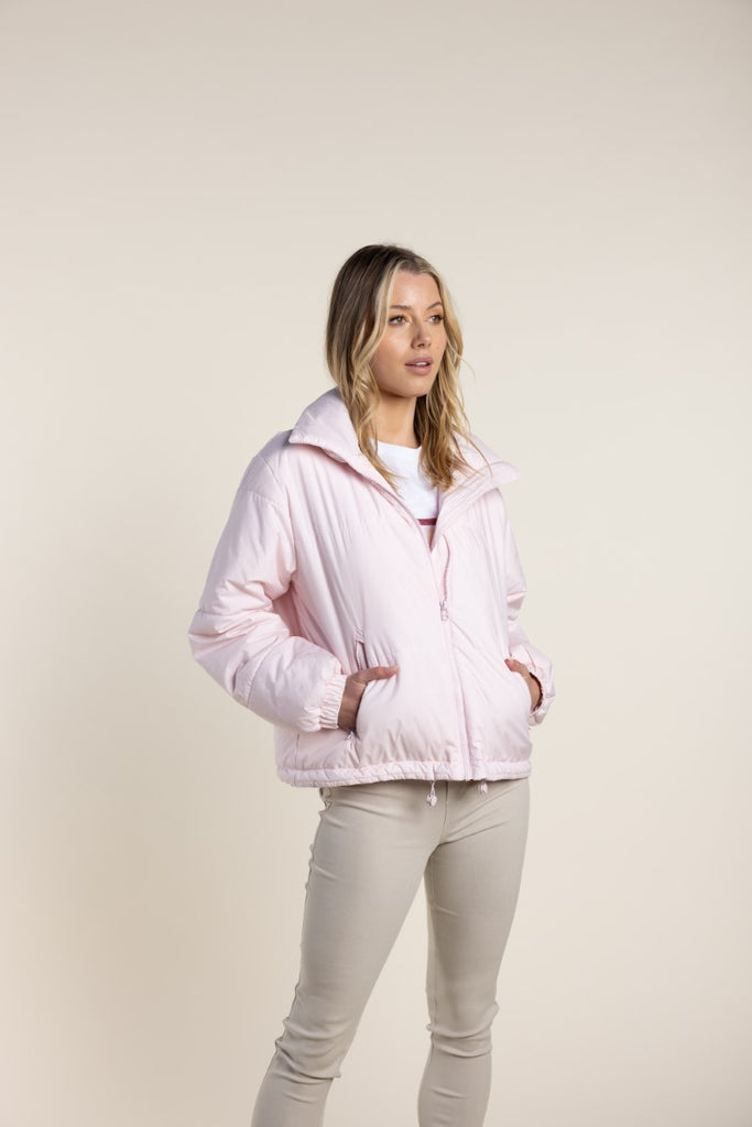short-puffer-w-hood-in-pale-pink-two-ts-side-view_1200x