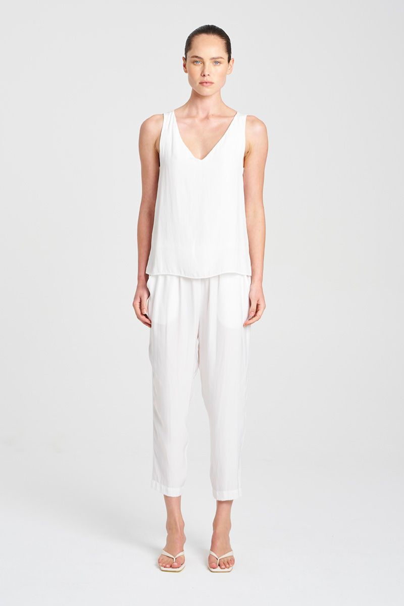 Woman wearing Soft Capri in White by Mela Purdie F67 1615, full length front view 03.