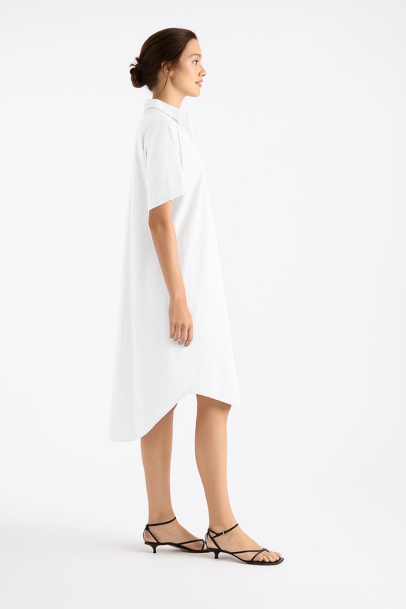 Woman wearing a white dress on a white background