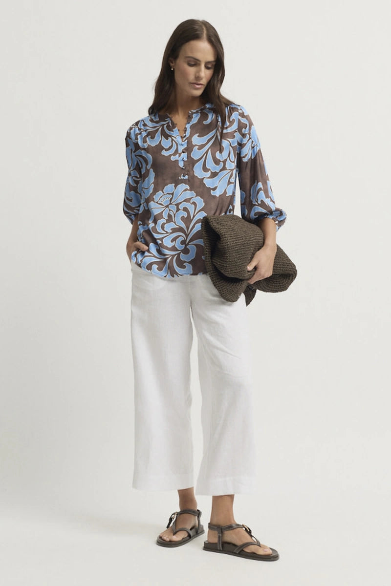 Yarra Trail Elegance Blouse YTWN4390 in Elegance Print styled with white wide leg pants