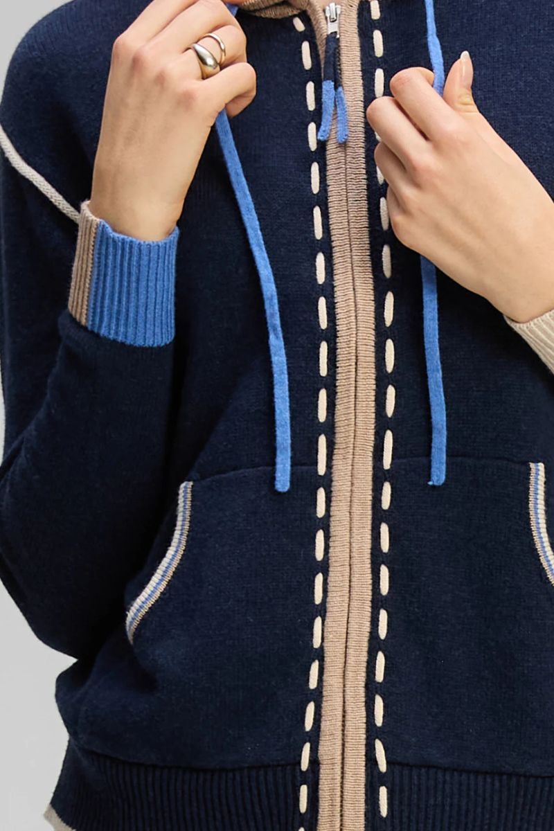 Woman wearing Threaded Hoodie in Dark Denim by Zaket & Plover closeup