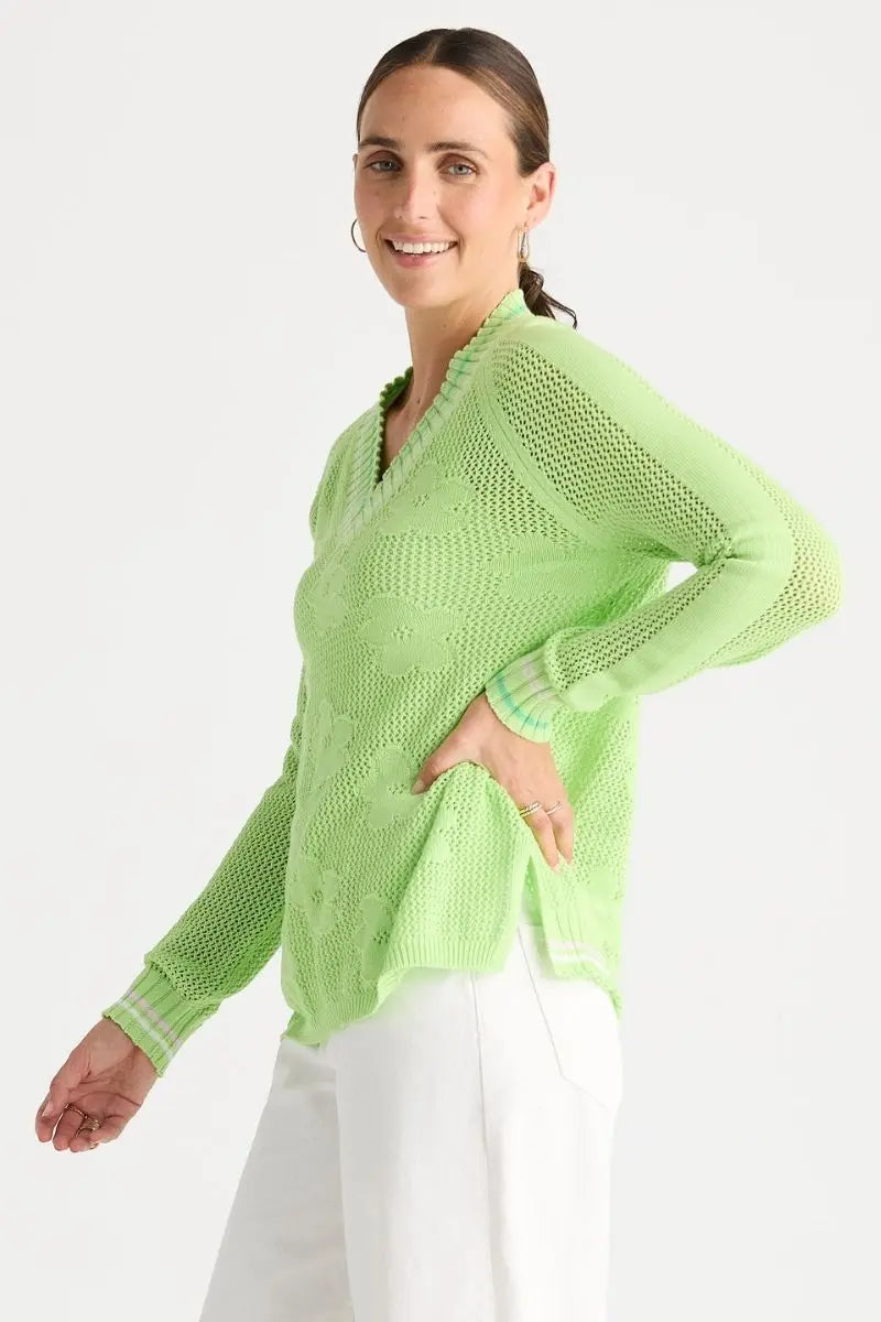 Woman wearing Floral Pointelle Vee Knit in Green by Zaket & Plover style ZP8813 side