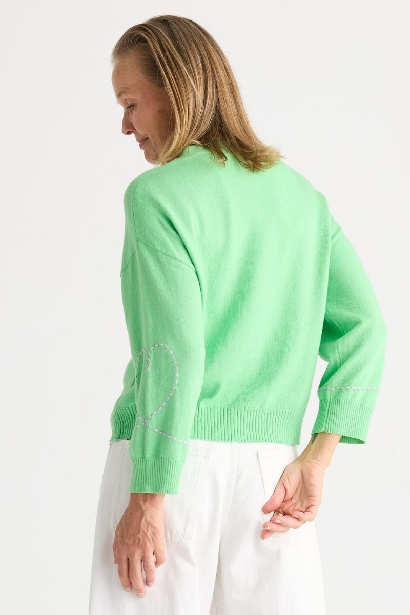 Sweet Heart Cardi in Apple styled with white pants ZP8821