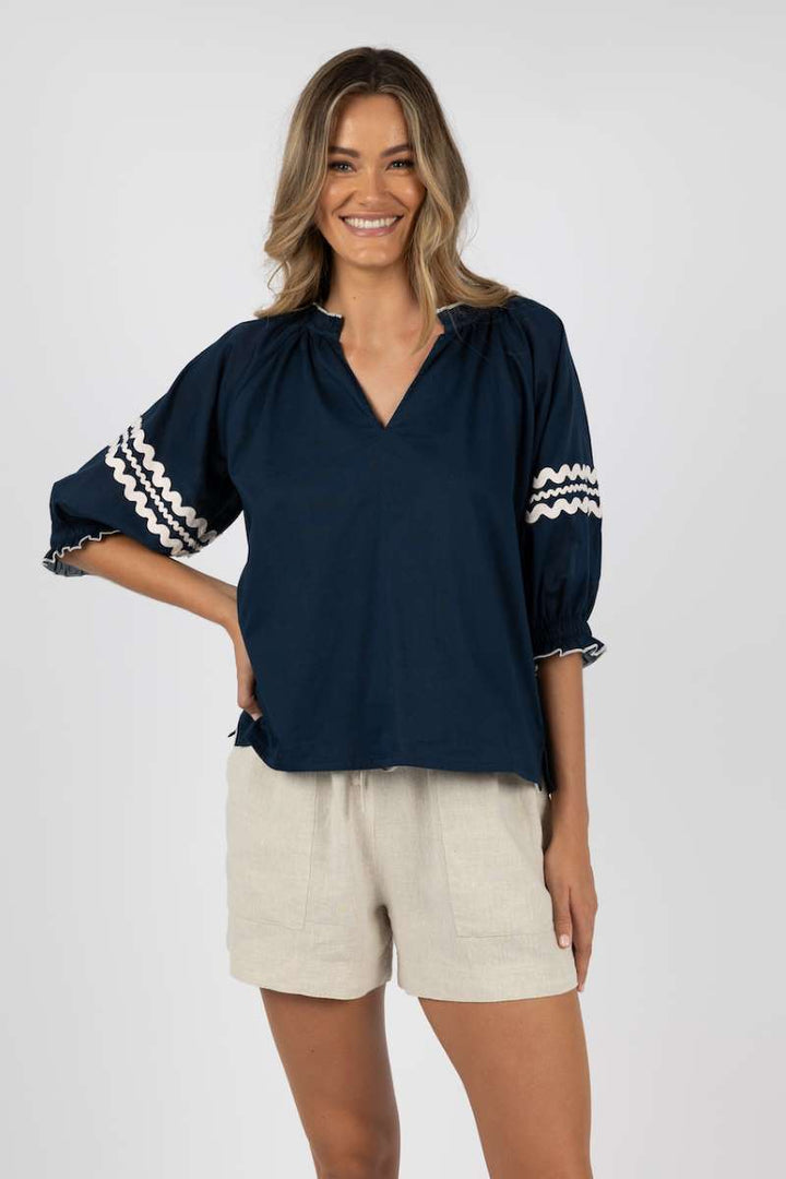 ziggy-blouse-in-navy-humidity-lifestyle-front-view_1200x