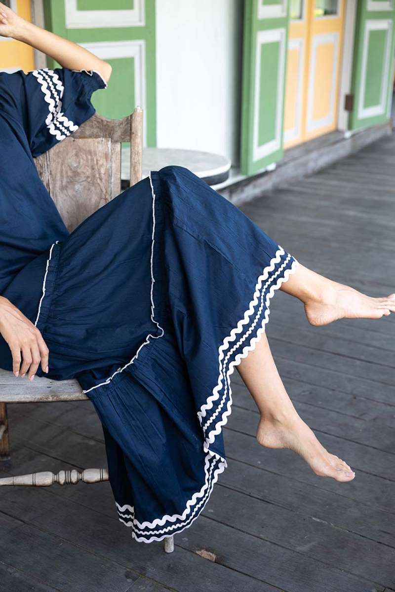 ziggy-skirt-in-navy-humidity-lifestyle-side-view_1200x